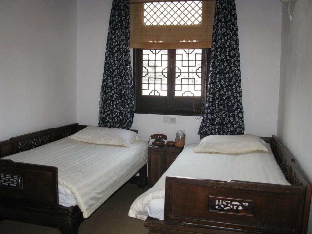 XI Di Travel Lodge Yi (Anhui) Стая снимка